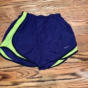Navy and neon yellow Nike shorts